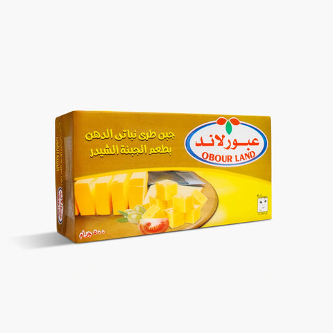 Obour Land soft cheddar flavor cheese spread in a 500g container, creamy and ideal for meals and sandwiches.