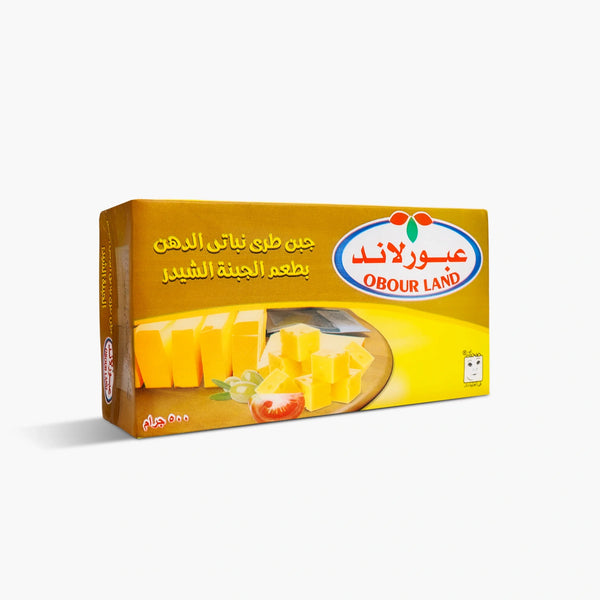 Obour Land soft cheddar flavor cheese spread in a 500g container, creamy and ideal for meals and sandwiches.