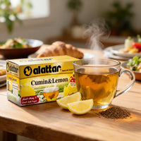 AlAttar Cumin and Lemon Herbal Tea in a box with 20 tea bags, natural sugar-free drink, fresh lemon and cumin ingredients visible
