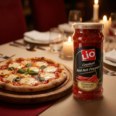 LIO Crushed Red Hot Pepper, a spicy condiment for cooking, shown in a jar with vibrant red crushed peppers.