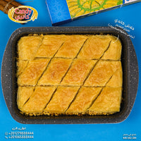 Candy premium filo pastry sheets, thin and flaky vegan-friendly dough for baklava, savory pies, and Mediterranean appetizers.