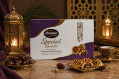 Hamdan Ajwa Ma'amoul date sweets, 400g traditional Arabic shortbread cookies filled with sweet Ajwa dates, shown on a plate.