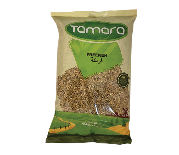 Tamara cracked green freekeh, roasted young wheat whole grain, shown in the 2lb package, with a focus on the dried green grains.