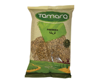 Tamara cracked green freekeh, roasted young wheat whole grain, shown in the 2lb package, with a focus on the dried green grains.