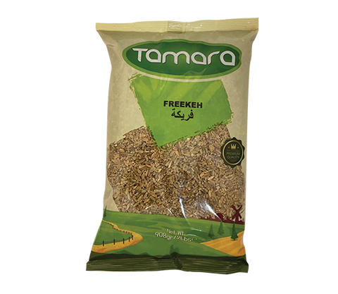 Tamara cracked green freekeh, roasted young wheat whole grain, shown in the 2lb package, with a focus on the dried green grains.