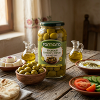 Tamara Baladi green olives in a glass jar, showcasing 45oz of natural Mediterranean snack with green olives visible inside the jar.