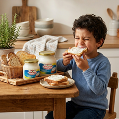 Processed cheese block from Obour Land by SANI-LLC, showing a 500g package with a smooth, creamy texture and vibrant yellow color.