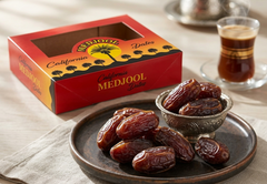 Jumbo-sized premium California Medjool dates from SANI-LLC, fresh, natural, with no added sugar, shown in the image.