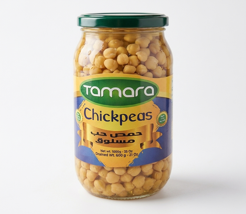 Tamara boiled chickpeas in a 1000g glass jar, ideal for salads and hummus, with visible chickpeas inside the jar.