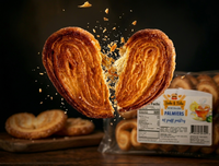 Bake & Take Palmiers Italian puff pastry snacks, golden baked, flaky, crescent-shaped treats in a 12-pack of 225g packages.