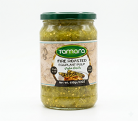 Tamara fire roasted eggplant pulp in 650g jar, ready-to-eat smoked puree, shown in a clear glass jar with eggplants in the background.