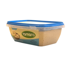 Tamara Vanilla Halva 700g traditional sesame tahini dessert with vanilla flavor, showing the creamy halva slice on a plate.