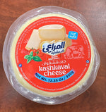 Almarai Aldemashkieh Kashkaval cheese slice and melt, 12.35oz, showing the yellow cheese with sliced pieces on a wooden board.
