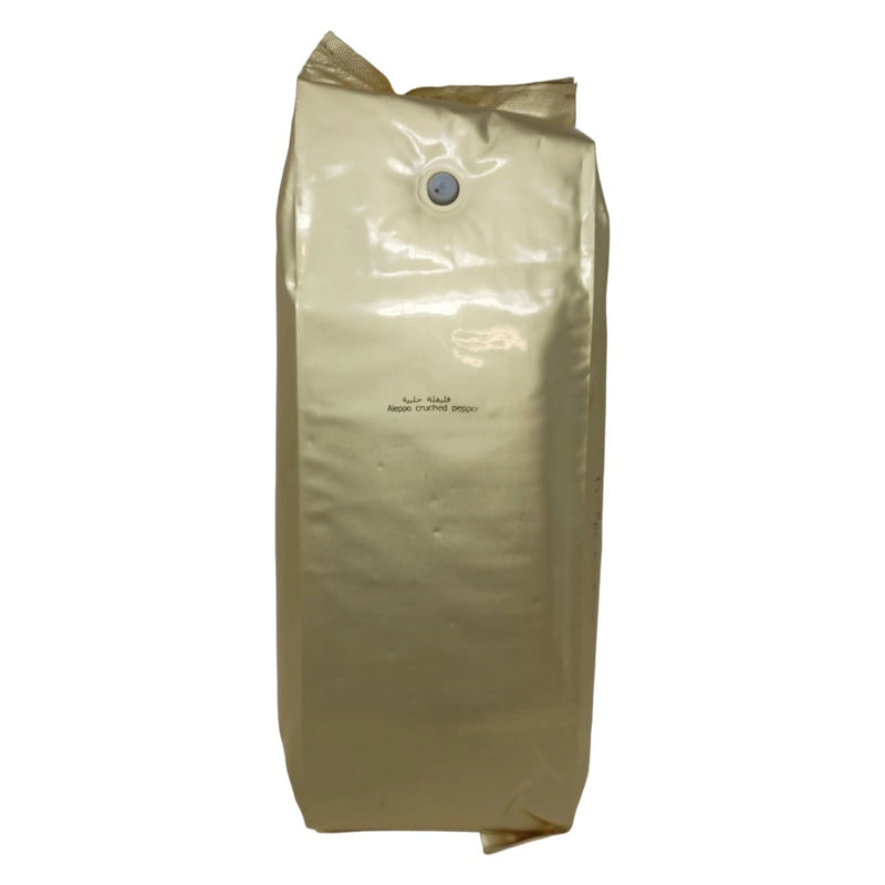 Homey Foods Aleppo crushed pepper in a 5lb bag, showing the vibrant red spice used for flavorful cooking and seasoning.