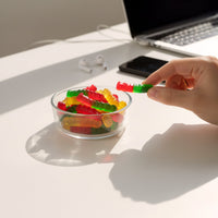 Six 6oz cups of Fun Fruit Bites gummy worm candies featuring colorful fruit-flavored gummy worms in clear cups.