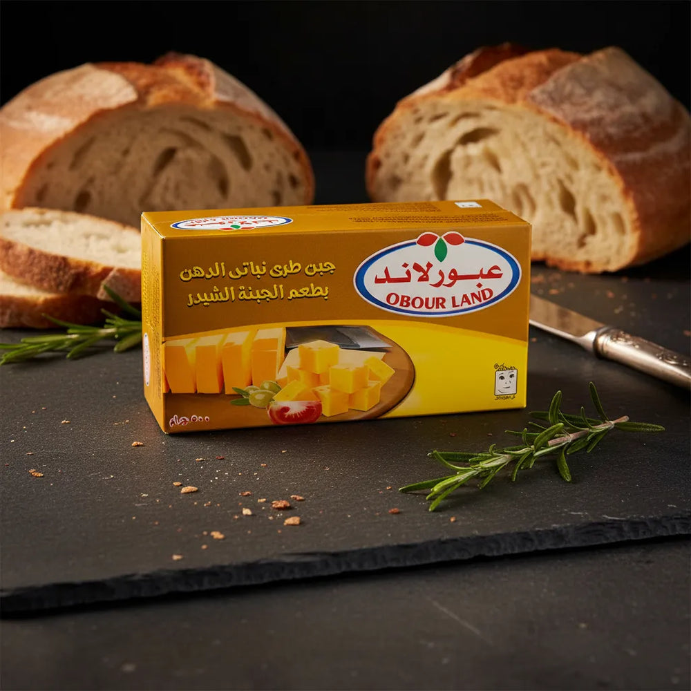 Obour Land soft cheddar flavor cheese spread in 500g jar, creamy texture, ideal for meals and sandwiches