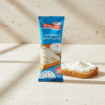 Obour Land Mafrouda cheese spread in squeeze pouch for sandwiches, shown in its packaging with branding and product details.