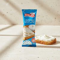 Obour Land Mafrouda cheese spread in squeeze pouch for sandwiches, shown in its packaging with branding and product details.