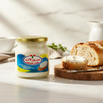 Obour Land 500g jar of spreadable processed cheese with creamy white texture, ideal for breakfast and snacks.